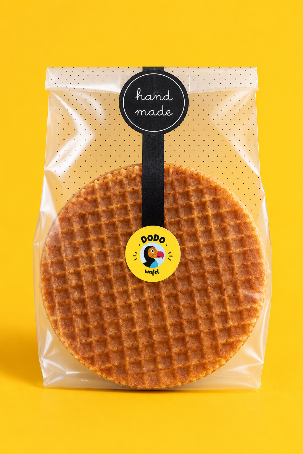 Handmade Dodo Wafel in clear packaging on a yellow background